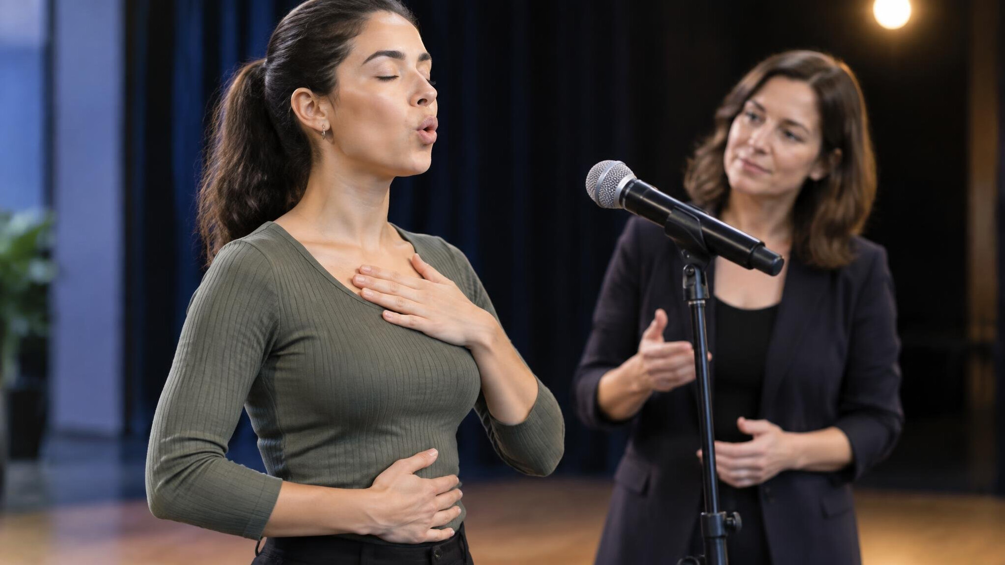 woman practicing voice exercises