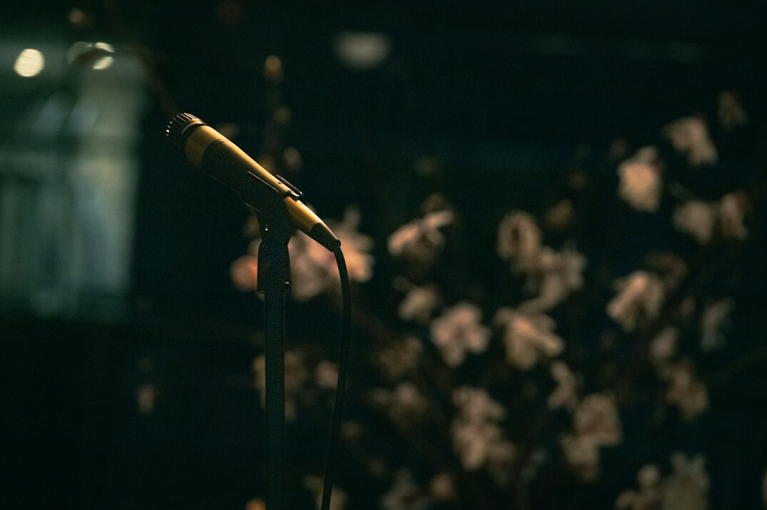 confident speaker on stage