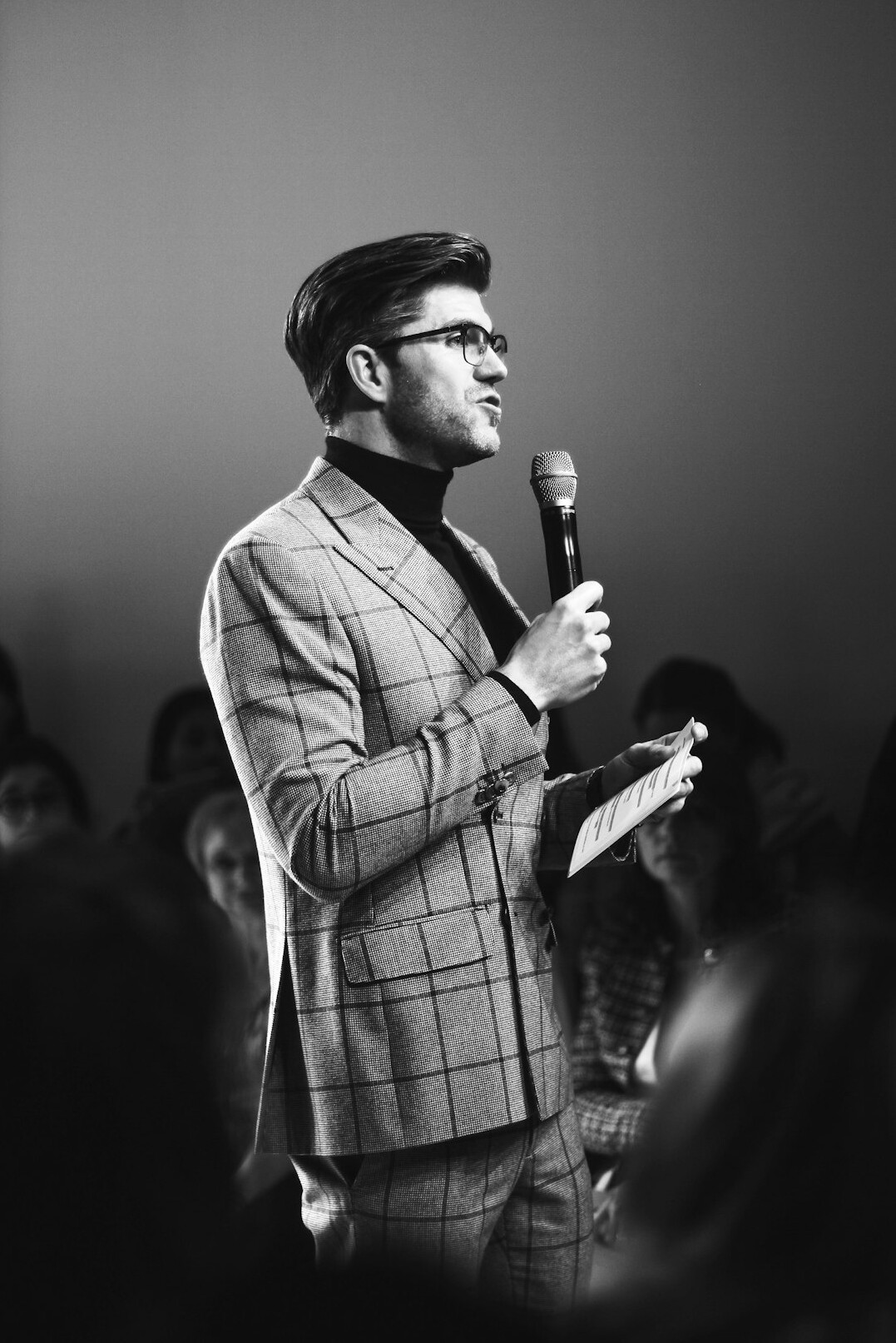 man delivering speech