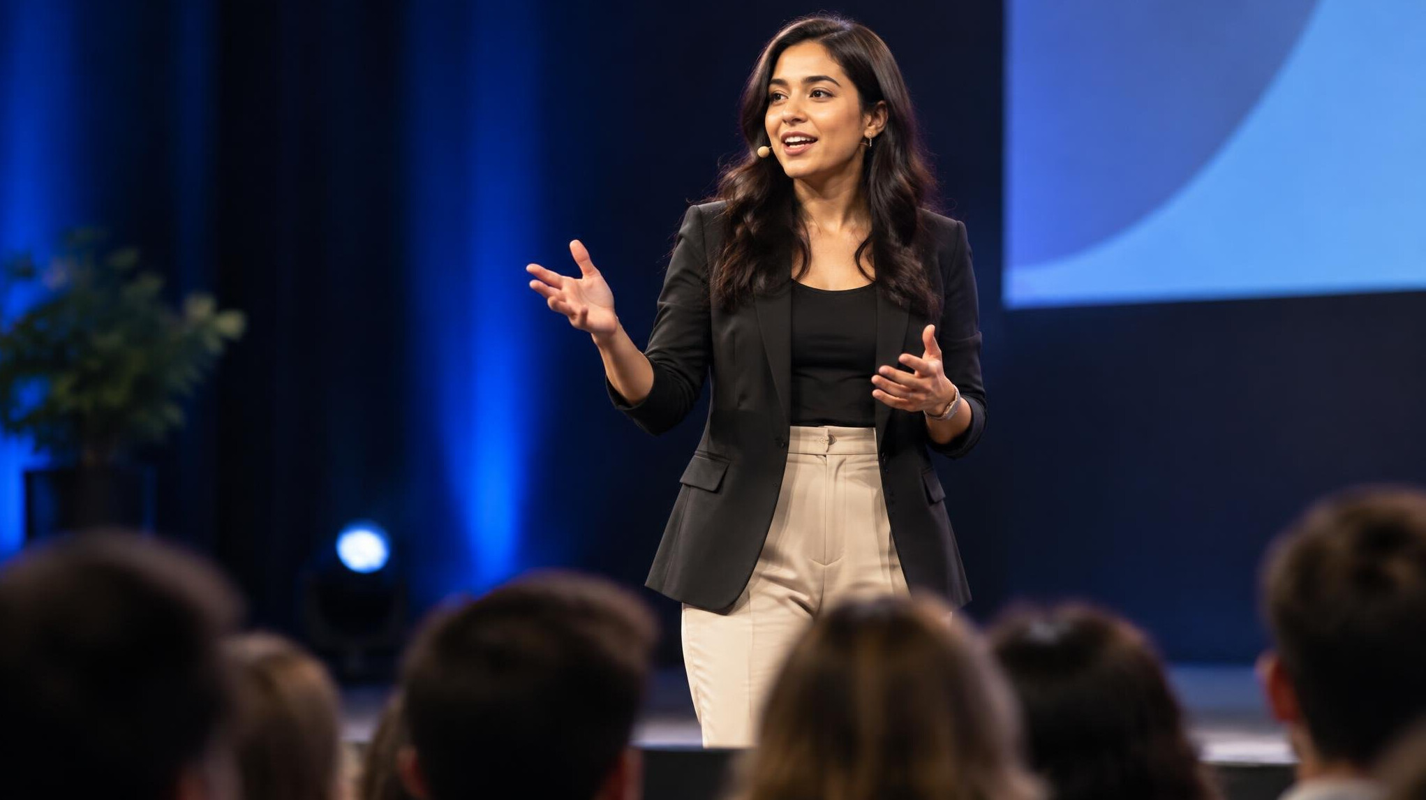 female speaker engaging crowd